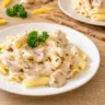 penne pasta carbonara cream sauce with mushroom - Italian food style