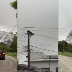 Balão cai sobre casas em Eunápolis e causa queda de energia na região