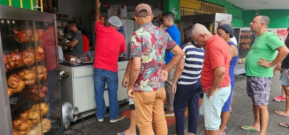 fila frango assado véspera de natal