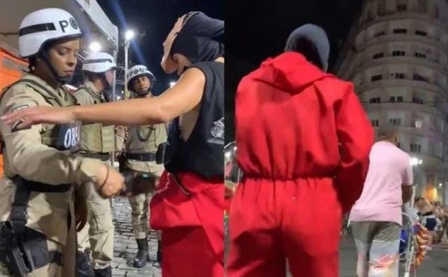 Com máscara de La Casa de Papel e macacão vermelho, Anitta curte pipoca do carnaval