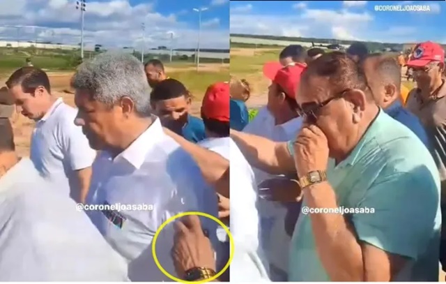 Prefeito limpa meleca em camisa do governador